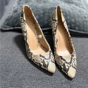 Cream and Black Stiletto Heels with Elegant Design